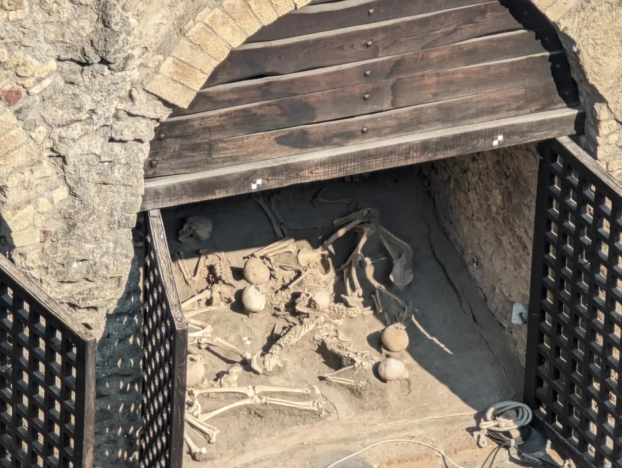  An image of the human remains in the  ancient preserved city of Herculaneum, victim of the same Lava flows the buried Pompeii  